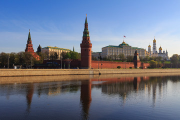 Fototapeta premium View of Kremlevskaya embankment and Moscow Kremlin on a sunny spring morning