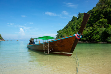 Fototapeta na wymiar Long tail boat on the beach.Wonderful background.