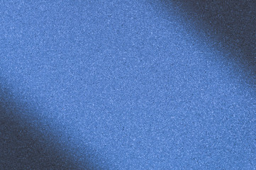 Granite background with blue color with small dots. Darkening left and right diagonally.