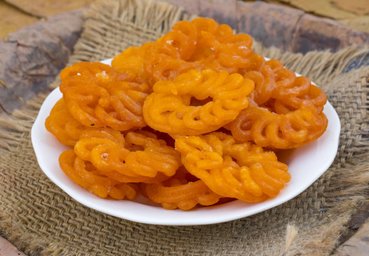 Indian Traditional Sweet Imarti Also Know as Amriti, Omriti, Jahangir, Jalebi, Jaangiri. It is Mde by Deep-Frying Vigna Mungo Flour Batter in a Kind of Circular Flower Shape.