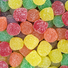 Sugar coated gummy candy close view.