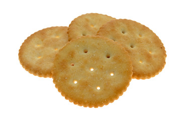 A small pile of yellow snack crackers on a white background.