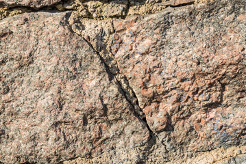 Detailed closeup of brown stone rock texture