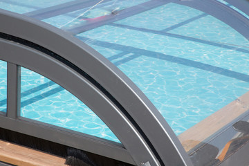 Detail of roof in swimming pool in summer
