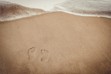 huellas en la arena