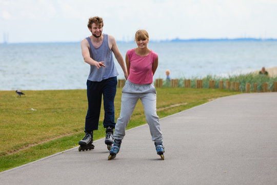 Teens together on skating date.