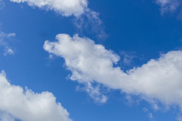 Blue sky and white clouds. Nature cloud landscape. Clouds in the blue sky. Blue sky background