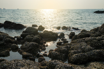 seascape with sunset on water with lighting filter