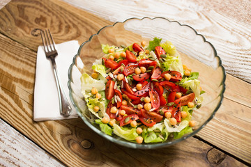 Salad with chickpeas, cherry tomatoes and seeds