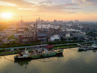 Aerial view of twilight of oil refinery ,Shot from drone of Oil refinery and Petrochemical plant at dusk , Bangkok, Thailand