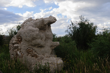 Classic sand stone formations, known as Tufa, higlighted along the coast line of Mono Lake, near...