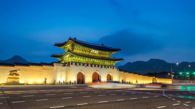 Time lapse of Gyeongbokgung palace and traffic at night in Seoul,South korea.(Zoom out)