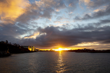 Naklejka na ściany i meble Sunset in Bronnoysund harbor in Northern Norway