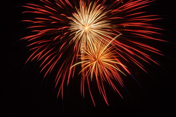 fireworks going off at night in the summer time