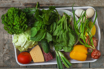 set of ingredients, a variety of vegetables, sausage and cheese - fresh vegetables (meal outdoors) - cuisine.  Food background