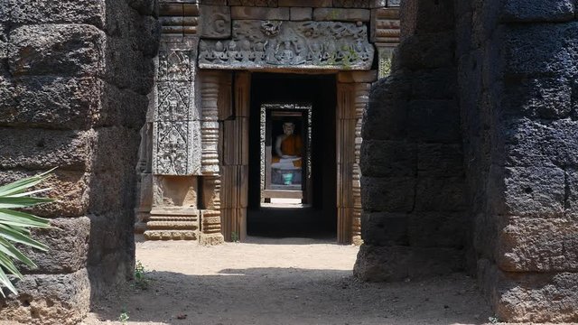  In The Temple , There Are Four Buddhist Statues Faced Between The Gates Toward The Four Directions. ( Zoom Out)