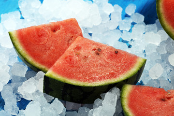 watermelon on blue background. juicy summer fruit in slices