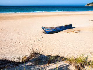 wodden fishing boat on the beach of Bolonia, Tarifa, Costa de la Luz, Cadiz, Spain