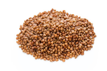 Buckwheat grains isolated on the white background.
