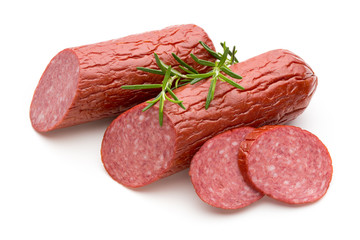 Salami smoked sausage, basil leaves on white background cutout.