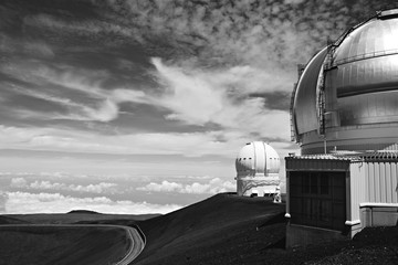 Fototapeta na wymiar Mauna Kea Observatories. 4,200 meter high summit of Mauna Kea, the world's largest observatory for optical, infrared, and submillimeter astronomy. Big Island of Hawaii. 