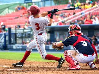 Fototapeta baseball player hitting and sliding obraz