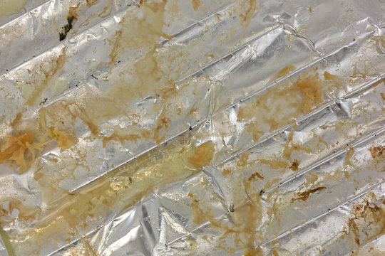 Close view of grease on tinfoil.