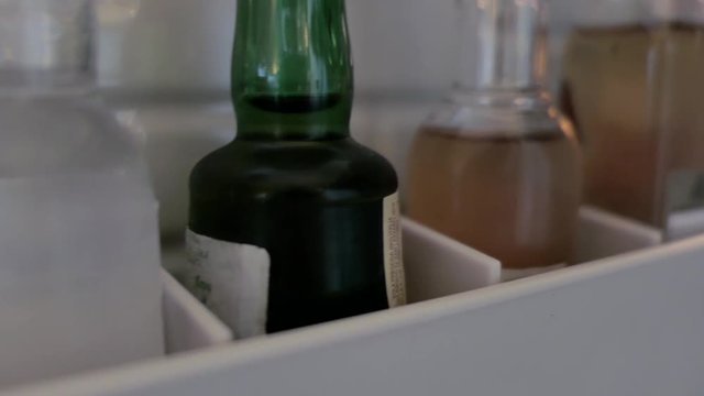 small bottles of alcoholic beverages in hotel minibar