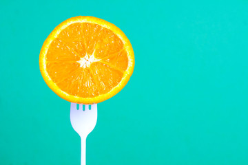 orange fruit fresh bright fork art background