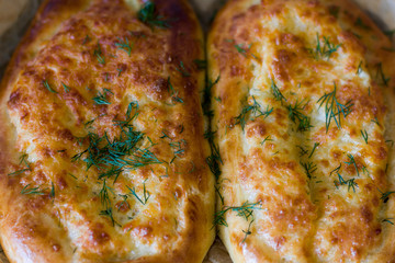 Georgian Khachapuri according to Adjarian close-up. Fresh traditional pastries.