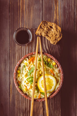 Asian food Chinese soup with noodles in bowl