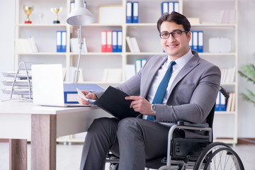 Disabled businessman working in the office