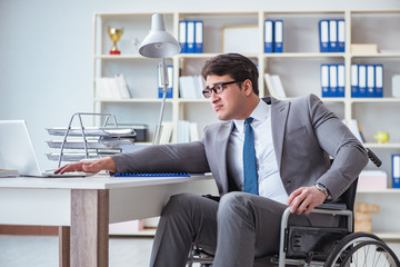 Disabled businessman working in the office