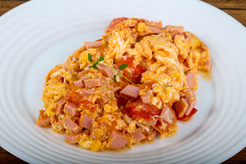 Scramble with sausages