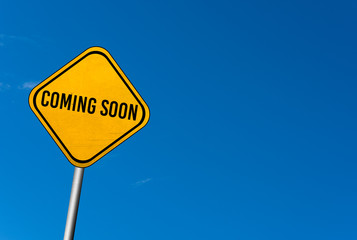 coming soon - yellow sign with blue sky