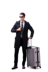 Young businessman with suitcase ready for business trip on white