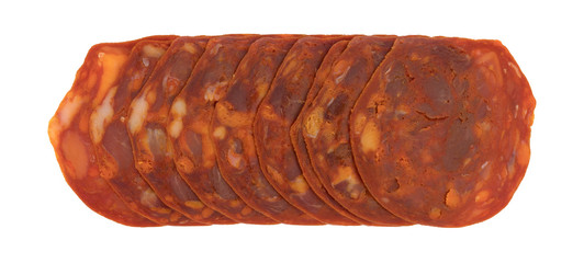 Top view of a row of slices of pork sausage luncheon meat on a white background.