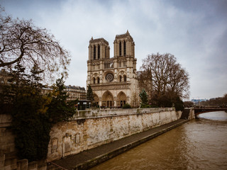 Fototapeta na wymiar Notre Dame Cathedral is located in the heart of Paris on the largest island of the Seine river.