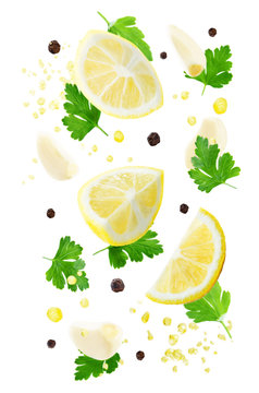Flying lemons with parsley, garlic and oil spray