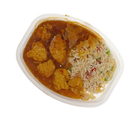 Top view of a frozen chicken nugget TV dinner isolated on a white background.