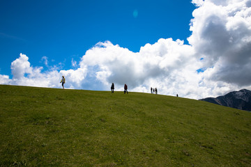 Panorama of the gorgeous  alps mountains Monte Baldo mountain and white clouds Macesine, Provincia di Verona, Veneto, Italy