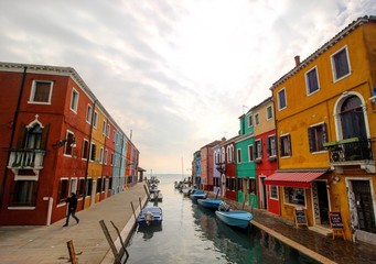Fototapeta na wymiar Burano, Italy - Colourful Houses along the Canal