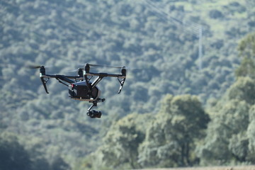 Dron flying over the forest