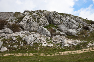 Panorama of the gorgeous  alps mountains Monte Baldo mountain and white clouds Macesine, Provincia di Verona, Veneto, Italy