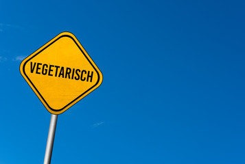 Vegetarisch - yellow sign with blue sky