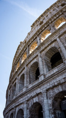Fototapeta premium Outside walls of the Colosseum in Rome, Italy