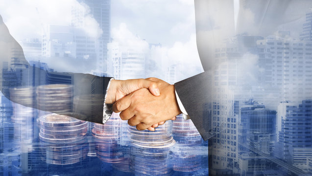 Double exposure image of the businessman handshake working , cryptocurrency concept