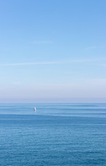 Obraz premium Sailing ship sailing in the distance through the Mediterranean