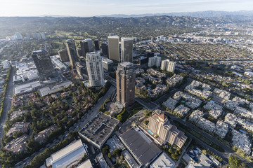 Fototapeta na wymiar Aerial view of Los Angeles Century City towers with Beverly Hills and the Santa Monica Mountains in background.