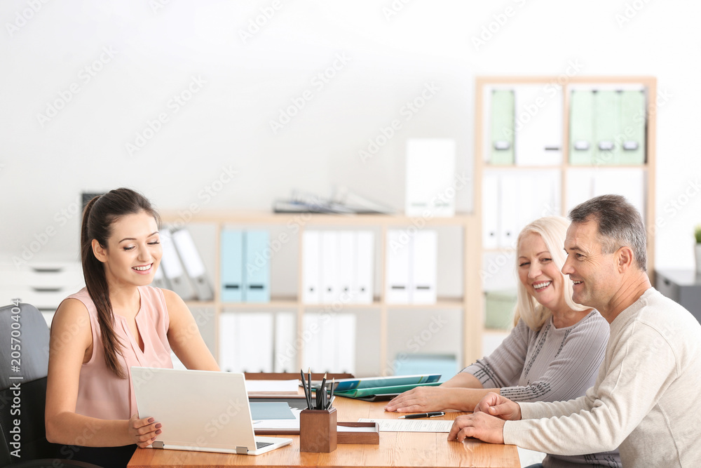 Wall mural Mature couple at notary public office